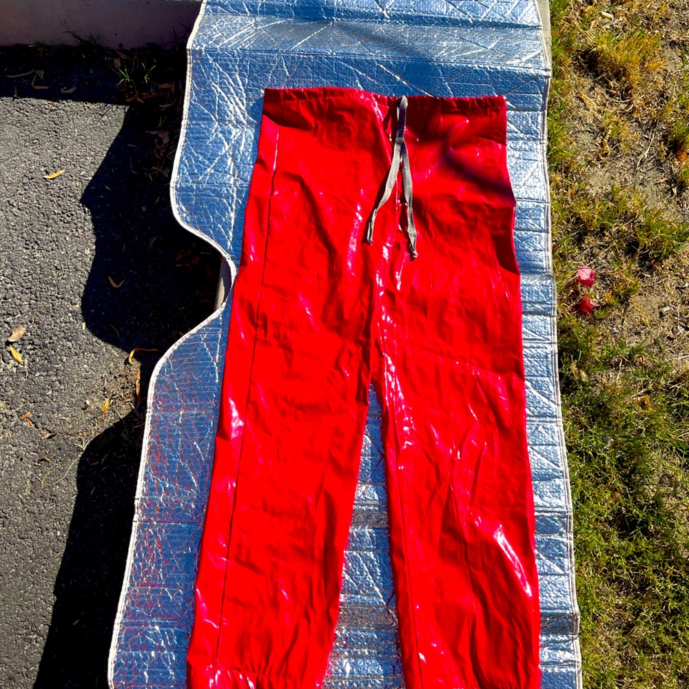 Size medium latex pants, Calvin Klein, bright red drawstring tie